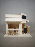 Creative wooden miniature shop figurine with a small blackboard and terrace, natural wood-toned tabletop decoration, handmade assembly model—perfect as a gift