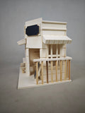 Creative wooden miniature shop figurine with a small blackboard and terrace, natural wood-toned tabletop decoration, handmade assembly model—perfect as a gift