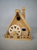 Hand-assembled wooden birdhouse, intricate architectural model birdhouse, raw wood white blank graffiti, creative stilt-house bird nest, garden decoration craft